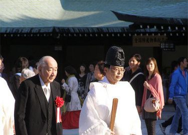 Shinto priest leading a procession in Tokyo